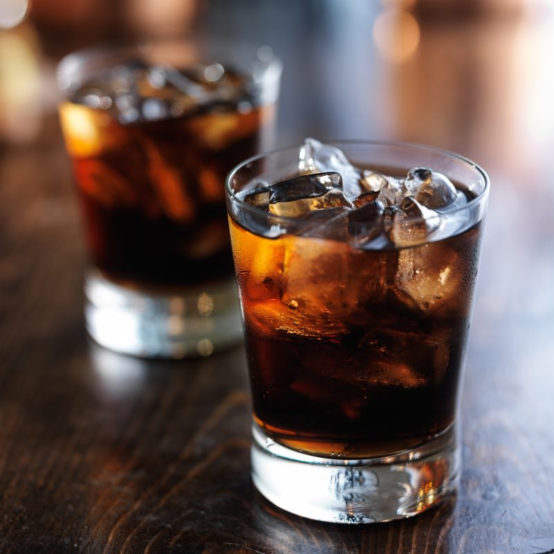 cold-fizzy-cola-soda-with-ice-in-glass-cup.jpg